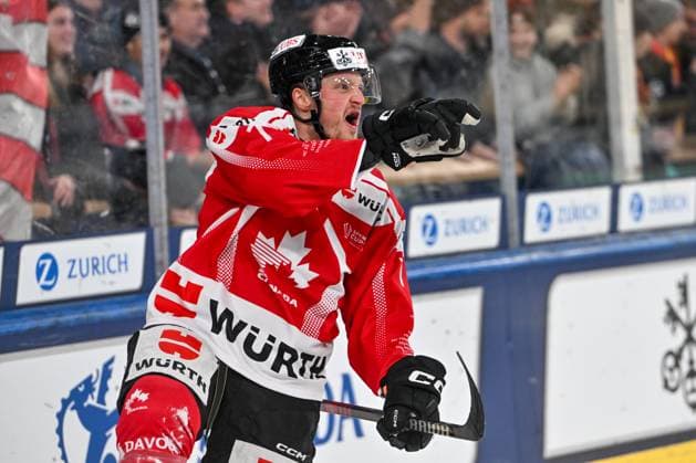 DAVOS, SWITZERLAND - DECEMBER 30: Daniel Carr of Team Canada celebrates his goal during the Spengler Cup Davos Semifinals match between Team Canada and Straubing Tigers at Eisstadion Davos on December 30, 2024 in Davos, Switzerland. Davos Eisstadion Davos Graubunden Switzerland Copyright: xJustPictures.ch AndreaxBrancax jp-en-EuSpIm-SpenglerCup_Canada_01506