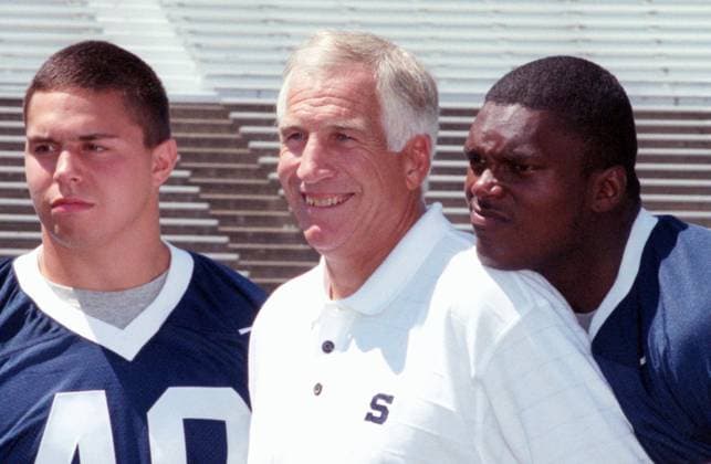 Jerry Sandusky In this August 6, 1999 file photograph, Lavar Arrington, right, goofs around with former Penn State defensive coordinator Jerry Sandusky during a photo on Media Day. On Sandusky s left is Aaron Gatten. On November 5, 2011, Sandusky was arrested on charges that he preyed on boys he met through The Second Mile, a charity he founded for at-risk youths. He faces charges including seven counts of first-degree involuntary deviate sexual intercourse, all of which are punishable by up to 20 years in prison and a $25,000 fine. (Centre Daily Times MCT) University Park PA USA EDITORIAL USE ONLY Copyright: xx 1113775 Mbrx krtphotoslive520330