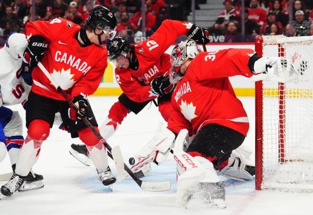 December 31, 2024, Ottawa, On, Canada: Canada goaltender Carter George (30), Caden Price (4) and Jett Luchanko (12) battle for the puck against the United States during first period IIHF World Junior Hockey Championship tournament action in Ottawa on Tuesday, Dec. 31, 2024. Canada News - December 31, 2024  - ZUMAc35_ 20241231_zaf_c35_007 Copyright: xSeanxKilpatrickx