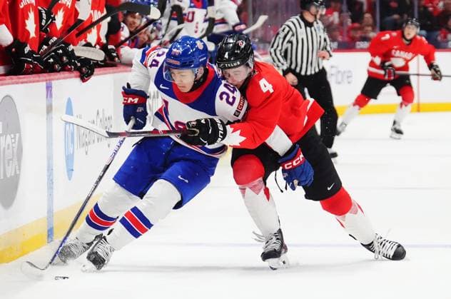 December 31, 2024, Ottawa, On, Canada: USA s Cole Hutson (24) protects the puck from Canada s Caden Price (4) during first period IIHF World Junior Hockey Championship tournament action in Ottawa on Tuesday, Dec. 31, 2024. Canada News - December 31, 2024  - ZUMAc35_ 20241231_zaf_c35_009 Copyright: xSeanxKilpatrickx