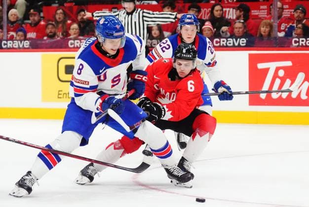 December 31, 2024, Ottawa, On, Canada: USA s Brandon Svoboda (8) and Canada s Tanner Molendyk (6) battle for the puck during third period IIHF World Junior Hockey Championship tournament action in Ottawa on Tuesday, Dec. 31, 2024. Canada News - December 31, 2024  - ZUMAc35_ 20241231_zaf_c35_039 Copyright: xSeanxKilpatrickx