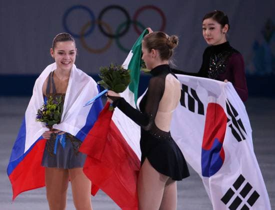 Ladies Free Skate Figure skating, Eiskunstlauf Adelina Sotnikova (left) of Russia celebrates her gold medal in ladies figure skating at the Iceberg Skating Palace during the Winter Olympics in Sochi, Russia, Thursday, Feb. 20, 2014. Carolina Kostner of Italy (center) won the bronze and Yuna Kim of South Korea won the silver. (Brian Cassella Chicago Tribune MCT) SOCHI RUS EDITORIAL USE ONLY Copyright: xx 1149421 BrianxCassellax krtphotoslive665974