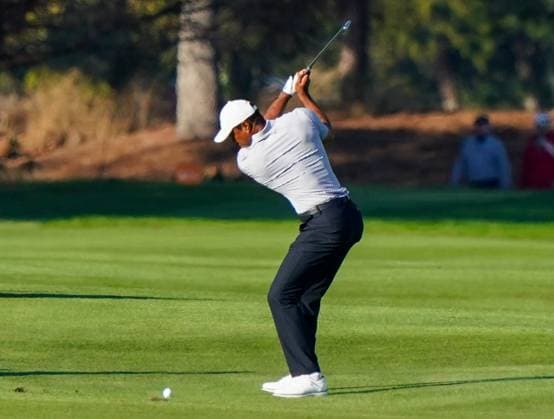 December 21, 2024, Orlando, Florida, USA: Tiger Woods hits a fairway shot on the 18th hole during the first round of the PNC Championship at the Ritz-Carlton Golf Club. Orlando USA - ZUMAw109 20241221_fap_w109_048 Copyright: xDebbyxWongx