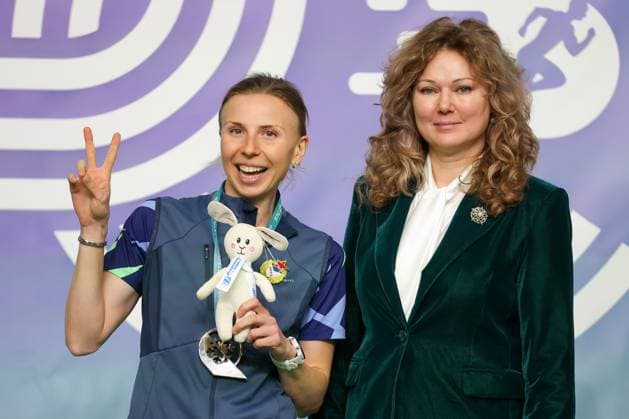 RUSSIA, YEKATERINBURG - JANUARY 7, 2025: World champion runner Olga Kotlyarova (R) poses with medallist Yekaterina Renzhina at a victory ceremony after the Roshdestvenskiye Starty Christmas Starts track-and-field competition at the Luch Sports Complex. Donat Sorokin TASS  77258322