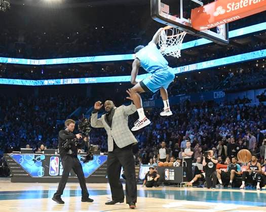 AT&T Slam Dunk Contest The Oklahoma City Thunder s Hamidou Diallo hangs on the rim after dunking over Shaquille O Neal during the AT&T Slam Dunk Contest at Spectrum Center in Charlotte, N.C., on Saturday, Feb. 16, 2019. (David T. Foster III Charlotte Observer TNS) CHARLOTTE NC USA EDITORIAL USE ONLY Copyright: xx 1269339 DavidxT.xFosterxIIIx krtphotoslive854120