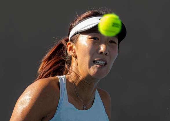 (250108) -- MELBOURNE, Jan. 8, 2025 -- Gao Xinyu reacts during the women s singles qualifying 2nd round match between Gao Xinyu of China and Petra Martic of Croatia at Australian Open tennis tournament in Melbourne, Australia, Jan. 8, 2025. (Photo by Xinhua) (SP)AUSTRALIA-MELBOURNE-TENNIS-AUSTRALIAN OPEN-QUALIFYING ChuxChen 