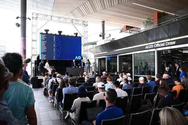 TENNIS AUSTRALIAN OPEN DRAW, Australian Open referee Wayne McKewen (centre) draws a women?s singles player alongside Tennis Australia CEO Craig Tiley (left) during the draw for the 2025 Australian Open tennis tournament, at Melbourne Park, Melbourne, Thursday, January 09, 2025. ( NO ARCHIVING, EDITORIAL USE ONLY, NO USE IN BOOKS WITHOUT CONSENT Melbourne Victoria Australia  Copyright: xJOELxCARRETTx 20250109194301166347