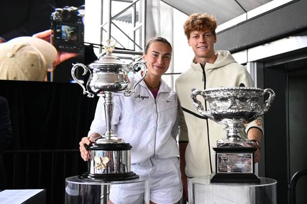 TENNIS AUSTRALIAN OPEN DRAW, Aryna Sabalenka of Belarus (left) poses for a photo with the Daphne Akhurst Memorial Cup and Jannik Sinner of Italy (right) poses for photographs with the Norman Brookes Challenge Cup pose for a photo during the draw for the 2025 Australian Open tennis tournament, at Melbourne Park, Melbourne, Thursday, January 09, 2025. ( NO ARCHIVING, EDITORIAL USE ONLY, NO USE IN BOOKS WITHOUT CONSENT Melbourne Victoria Australia  Copyright: xJOELxCARRETTx 20250109110474634796