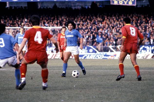 Serie A match between Napoli, S.S.C and A.S. Roma NAPLES, ITALY - DECEMBER 16: Diego Armando Maradona,during a Serie A match between Napoli, S.S.C and A.S. Roma at Stadio San Paolo on December 16, 1984 in Naples, Italy. Naples Italy Copyright: xStefanoxMontesix