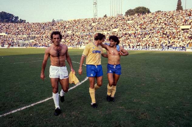 Serie A match between Napoli, S.S.C and S.S. Lazio ROME, ITALY - OCTOBER 14: Joao Batista da Silva, S.S. Lazio, Diego Armando Maradona, Napoli, S.S.C and Daniel Bertoni, Napoli, S.S.C, during a Serie A match between Napoli, S.S.C and S.S. Lazio at Stadio Olimpico on October 14, 1984 in Rome, Italy. Rome Italy Copyright: xStefanoxMontesix