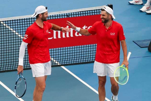 TENNIS ADELAIDE INTERNATIONAL, Simone Bolelli and Andrea Vavassori of Italy celebrate victory in the mens doubles Final match against Kevin Krawietz and Tim Puetz of Germany during the Adelaide International at Memorial Drive Tennis Club in Adelaide, Saturday, January 11, 2025. ( NO ARCHIVING, EDITORIAL USE ONLY, NO USE IN BOOKS WITHOUT CONSENT ADELAIDE SOUTH AUSTRALIA AUSTRALIA  Copyright: xMATTxTURNERx 20250111131042784379