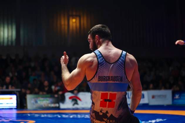 Halbfinale Ringer Bundesliga - ASV Schorndorf vs. SV Wacker Burghausen 75kg Freistil - David Baev (SV Wacker Burghausen in Blau) während des Halbfinal-Kampfes der Deutschen Mannschaftsmeisterschaft zwischen dem ASV Schorndorf und dem SV Wacker Burghausen in der Birtat Ringer-Bundesliga am 01.01.2025 in Schorndorf, Deutschland.