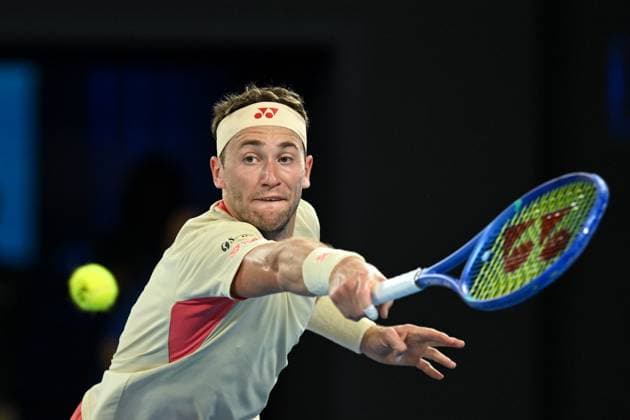TENNIS AUSTRALIAN OPEN DAY1, Casper Ruud of Norway plays a return during his Men?s Singles Round 1 match against Jaume Munar of Spain at the 2025 Australian Open at Melbourne Park in Melbourne, Sunday, January 12, 2025. ( NO ARCHIVING, EDITORIAL USE ONLY, NO USE IN BOOKS WITHOUT CONSENT MELBOURNE VICTORIA AUSTRALIA  Copyright: xLUKASxCOCHx 20250112151852560946