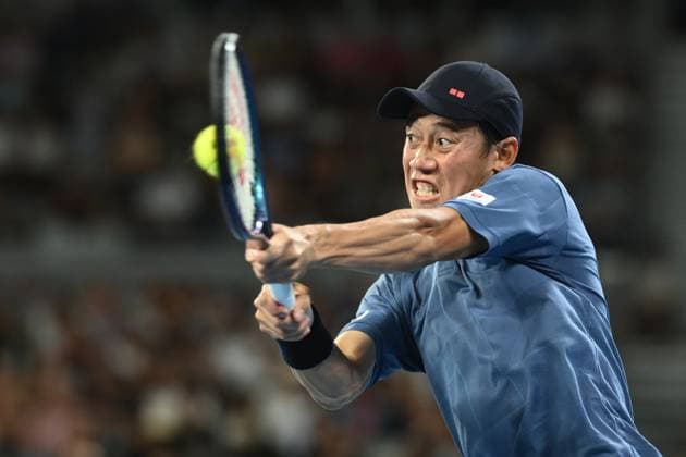 TENNIS AUSTRALIAN OPEN, Kei Nishikori of Japan returns during his round 1 match against Thiago Monteiro of Brazil during the 2025 Australian Open at Melbourne Park in Melbourne, Sunday, January 12, 2025. ( NO ARCHIVING, EDITORIAL USE ONLY, NO USE IN BOOKS WITHOUT CONSENT MELBOURNE VICTORIA AUSTRALIA  Copyright: xJOELxCARRETTx 20250112136443888945
