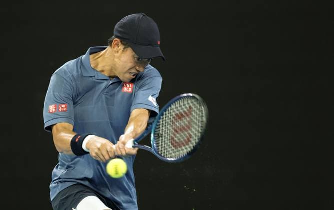 Tennis: Australian Open Japan s Kei Nishikori plays against Brazil s Thiago Monteiro in the first round of the men s singles at the Australian Open tennis tournament in Melbourne on Jan. 12, 2025.  A14AA0003969064P