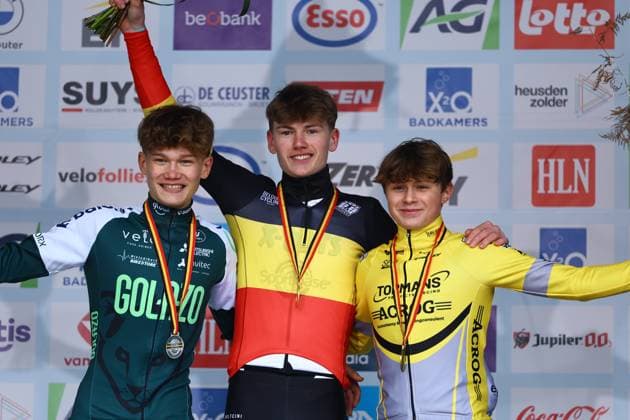 Belgian Lars Stockman and Belgian Cas Van Looke, Belgian Bas Vanden Eynde celebrate on the podium of the men U17, U 17 (second year) race of the Belgian Cyclocross Championships (11-12 01) on Sunday 12 January 2025 in Heusden-Zolder. DAVIDxPINTENS  x110234910x