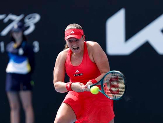 (250113) -- MELBOURNE, Jan. 13, 2025 -- Jelena Ostapenko hits a return during the women s singles first round match between Belinda Bencic of Switzerland and Jelena Ostapenko of Latvia at Australian Open tennis tournament in Melbourne, Australia, Jan. 13, 2025. ) (SP)AUSTRALIA-MELBOURNE-TENNIS-AUSTRALIAN OPEN-DAY 2 MaxPing 