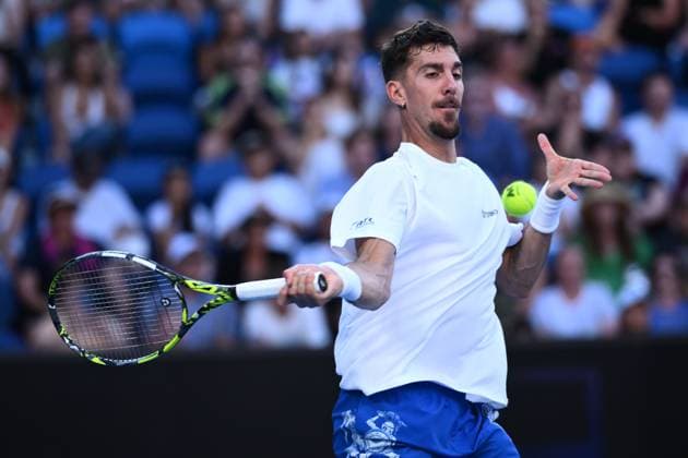 TENNIS AUSTRALIAN OPEN, Australian Thanasi Kokkinakis returns during his round 1 match against Roman Safiullin of Russia during the 2025 Australian Open at Melbourne Park in Melbourne, Monday, January 13, 2025. ( NO ARCHIVING, EDITORIAL USE ONLY, NO USE IN BOOKS WITHOUT CONSENT MELBOURNE VICTORIA AUSTRALIA  Copyright: xJOELxCARRETTx 20250113127070746617
