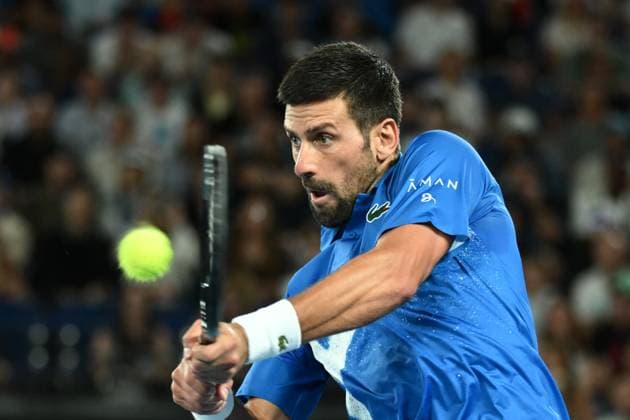 TENNIS AUSTRALIAN OPEN, Novak Djokovic of Serbia returns during his round 1 match against Nishesh Basavareddy of USA during the 2025 Australian Open at Melbourne Park in Melbourne, Monday, January 13, 2025. ( NO ARCHIVING, EDITORIAL USE ONLY, NO USE IN BOOKS WITHOUT CONSENT MELBOURNE VICTORIA AUSTRALIA  Copyright: xJOELxCARRETTx 20250113133353657820