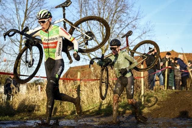 Belgian Witse Meeussen and Dutch Ryan Kamp pictured in action during the men s elite race of the Cyclocross Otegem cycling event, Monday 13 January 2025 in Otegem, the day after the Belgian national cyclocross championships. DAVIDxPINTENS  x110340524x