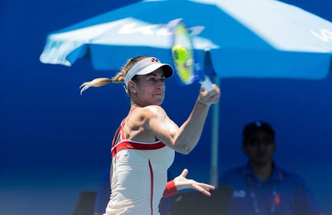 (250114) -- MELBOURNE, Jan. 14, 2025 -- Anna Bondar hits a return during the women s singles first round match between Wang Yafan of China and Anna Bondar of Hungary at Australian Open tennis tournament in Melbourne, Australia, Jan. 14, 2025. (Photo by Xinhua) (SP)AUSTRALIA-MELBOURNE-TENNIS-AUSTRALIAN OPEN-DAY 3 HuxJingchen 