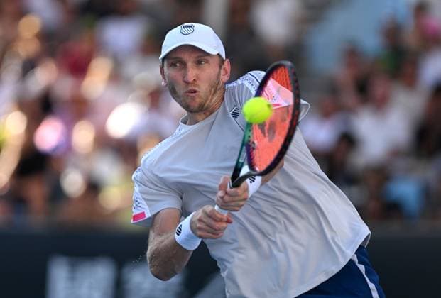 TENNIS AUSTRALIAN OPEN, Mitchell Kruger of USA returns during his round 1 match against Rinky Hijikata of Australia during the 2025 Australian Open at Melbourne Park in Melbourne, Tuesday, January 14, 2025. ( NO ARCHIVING, EDITORIAL USE ONLY, NO USE IN BOOKS WITHOUT CONSENT MELBOURNE VICTORIA AUSTRALIA  Copyright: xLUKASxCOCHx 20250114120107174521