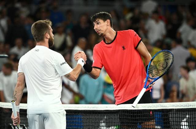 TENNIS AUSTRALIAN OPEN, Corentin Moutet of France is congratulated by Alexei Popyrin of Australia (right) following their 1st round match during the 2025 Australian Open at Melbourne Park in Melbourne, Tuesday, January 14, 2025. ( NO ARCHIVING, EDITORIAL USE ONLY, NO USE IN BOOKS WITHOUT CONSENT MELBOURNE VICTORIA AUSTRALIA  Copyright: xJOELxCARRETTx 20250114116931225448