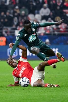 Fußball, Coupe de France, Stade Reims - AS Monaco FOOTBALL : Reims vs Monaco - Coupe de France - 14 01 2025 Joseph Okumu ( 2 - Reims ) and Diatta Krepin ( 17 - Monaco ) during the French Cup match between Stade de Reims and AS Monaco at Stade Auguste Delaune on January 14, 2025 in Reims, France. ( Photo by Dante Badano PsnewZ ) - ReimsFrance  Copyright: xDantexBadanox