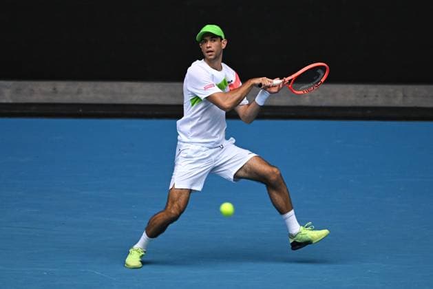 TENNIS AUSTRALIAN OPEN, Jaime Faria of Portugal in action during his round 2 match against Novak Djokovic of Serbia during the 2025 Australian Open at Melbourne Park in Melbourne, Wednesday, January 15, 2025. ( NO ARCHIVING, EDITORIAL USE ONLY, NO USE IN BOOKS WITHOUT CONSENT MELBOURNE VICTORIA AUSTRALIA  Copyright: xLUKASxCOCHx 20250115183819919695