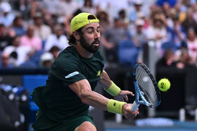 TENNIS AUSTRALIAN OPEN, Jordan Thompson of Australia returns during his round 2 match against Nuno Borges of Portugal during the 2025 Australian Open at Melbourne Park in Melbourne, Wednesday, January 15, 2025. ( NO ARCHIVING, EDITORIAL USE ONLY, NO USE IN BOOKS WITHOUT CONSENT MELBOURNE VICTORIA AUSTRALIA  Copyright: xJAMESxROSSx 20250115156641570096