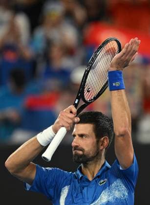 TENNIS AUSTRALIAN OPEN, Novak Djokovic of Serbia celebrates after winning his round 2 match against Jaime Faria of Portugal during the 2025 Australian Open at Melbourne Park in Melbourne, Wednesday, January 15, 2025. ( NO ARCHIVING, EDITORIAL USE ONLY, NO USE IN BOOKS WITHOUT CONSENT MELBOURNE VICTORIA AUSTRALIA  Copyright: xLUKASxCOCHx 20250115147112553825