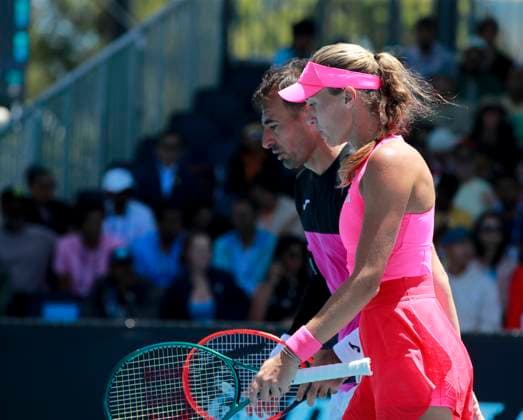(250117) -- MELBOURNE, Jan. 17, 2025 -- Kristina Mladenovic (R) Ivan Dodig react during the mixed doubles 1st round match between Zhang Shuai (China) Rohan Bopanna (India) and Kristina Mladenovic (France) Ivan Dodig (Croatia) at Australian Open tennis tournament in Melbourne, Australia, Jan. 17, 2025. ) (SP)AUSTRALIA-MELBOURNE-TENNIS-AUSTRALIAN OPEN-DAY 6 MaxPing 