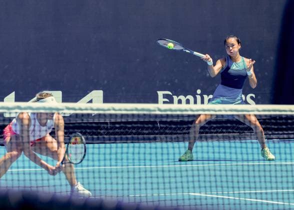 (250117) -- MELBOURNE,, Jan. 17, 2025 -- Yuan Yue (R) Ekaterina Alexandrova compete during the women s doubles second round match between Yuan Yue (China) Ekaterina Alexandrova (Russia) and Timea Babos (Hungary) Nicole Melichar-Martinez (the United States) at Australian Open tennis tournament in Melbourne, Australia, Jan. 17, 2025. (Photo by Xinhua) (SP)AUSTRALIA-MELBOURNE-TENNIS-AUSTRALIAN OPEN-DAY 6 ChuxChen 