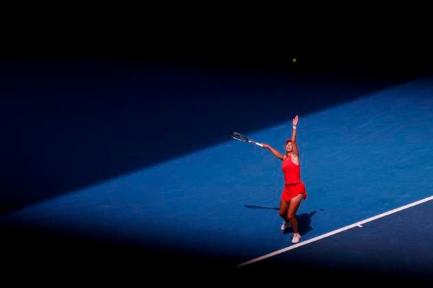 (250117) -- MELBOURNE, Jan. 17, 2025 -- Clara Tauson serves during the women s singles 3rd round match between Aryna Sabalenka of Belarus and Clara Tauson of Denmark at Australian Open tennis tournament in Melbourne, Australia, Jan. 17, 2025. ) (SP)AUSTRALIA-MELBOURNE-TENNIS-AUSTRALIAN OPEN-DAY 6 MaxPing 