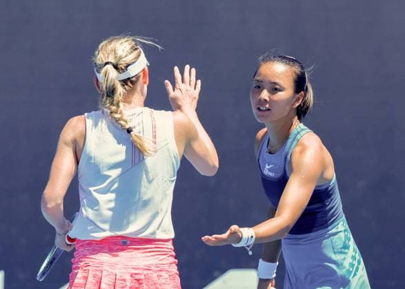 (250117) -- MELBOURNE,, Jan. 17, 2025 -- Yuan Yue (R) Ekaterina Alexandrova celebrate during the women s doubles second round match between Yuan Yue (China) Ekaterina Alexandrova (Russia) and Timea Babos (Hungary) Nicole Melichar-Martinez (the United States) at Australian Open tennis tournament in Melbourne, Australia, Jan. 17, 2025. (Photo by Xinhua) (SP)AUSTRALIA-MELBOURNE-TENNIS-AUSTRALIAN OPEN-DAY 6 ChuxChen 
