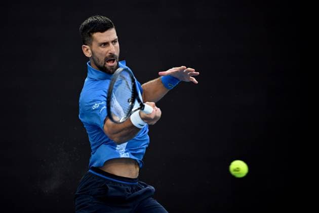 TENNIS AUSTRALIAN OPEN, Novak Djokovic of Serbia returns during his round three match against Tomas Machac of Czechia during the 2025 Australian Open at Melbourne Park in Melbourne, Friday, January 17, 2025. ( NO ARCHIVING, EDITORIAL USE ONLY, NO USE IN BOOKS WITHOUT CONSENT MELBOURNE VICTORIA AUSTRALIA  Copyright: xJAMESxROSSx 20250117119550521077