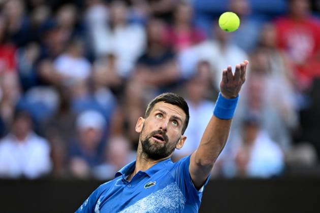 TENNIS AUSTRALIAN OPEN, Novak Djokovic of Serbia serves during his round three match against Tomas Machac of Czechia during the 2025 Australian Open at Melbourne Park in Melbourne, Friday, January 17, 2025. ( NO ARCHIVING, EDITORIAL USE ONLY, NO USE IN BOOKS WITHOUT CONSENT MELBOURNE VICTORIA AUSTRALIA  Copyright: xJAMESxROSSx 20250117120655942634