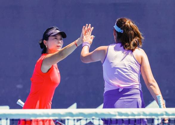(250117) -- MELBOURNE, Jan. 17, 2025 -- Xu Yifan (L) Yang Zhaoxuan celebrate scoring during the women s doubles second round match between Xu Yifan Yang Zhaoxuan of China and Hsieh Su-Wei (Chinese Taipe) Jelena Ostapenko (Latvia) at Australian Open tennis tournament in Melbourne, Australia, Jan. 17, 2025. (Photo by Xinhua) (SP)AUSTRALIA-MELBOURNE-TENNIS-AUSTRALIAN OPEN-DAY 6 ChuxChen 