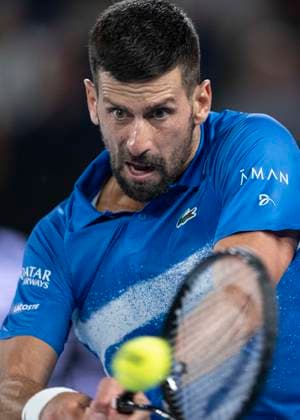 (250117) -- MELBOURNE, Jan. 17, 2025 -- Novak Djokovic hits a return during the men s singles 3rd round match between Novak Djokovic of Serbia and Tomas Machac of the Czech Republic at Australian Open tennis tournament in Melbourne, Australia, Jan. 17, 2025. ) (SP)AUSTRALIA-MELBOURNE-TENNIS-AUSTRALIAN OPEN-DAY 6 LuixSiuxWai 