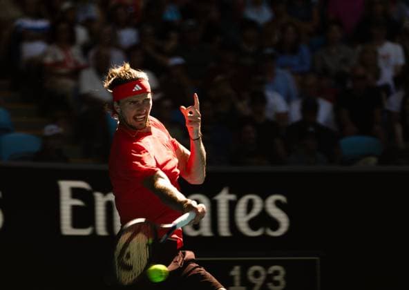 (250117) -- MELBOURNE, Jan. 17, 2025 -- Alexander Zverev of Germany hits a return to Jacob Fearnley of Britain during the men s singles 3rd round match at Australian Open tennis tournament in Melbourne, Australia, Jan. 17, 2025. (Photo by Xinhua) (SP)AUSTRALIA-MELBOURNE-TENNIS-AUSTRALIAN OPEN-DAY 6 HuxJingchen 