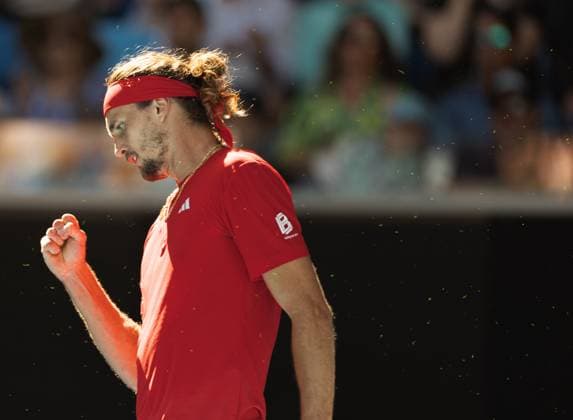 (250117) -- MELBOURNE, Jan. 17, 2025 -- Alexander Zverev of Germany celebrates scoring while competing against Jacob Fearnley of Britain during the men s singles 3rd round match at Australian Open tennis tournament in Melbourne, Australia, Jan. 17, 2025. (Photo by Xinhua) (SP)AUSTRALIA-MELBOURNE-TENNIS-AUSTRALIAN OPEN-DAY 6 HuxJingchen 