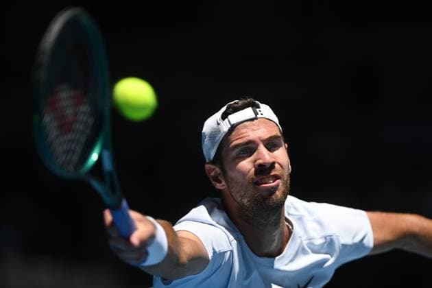 TENNIS AUSTRALIAN OPEN, Karen Khachanov of Russia returns during his round three match against Alex Michelsen of USA during the 2025 Australian Open at Melbourne Park in Melbourne, Saturday, January 18, 2025. ( NO ARCHIVING, EDITORIAL USE ONLY, NO USE IN BOOKS WITHOUT CONSENT MELBOURNE VICTORIA AUSTRALIA  Copyright: xLUKASxCOCHx 20250118168287389633