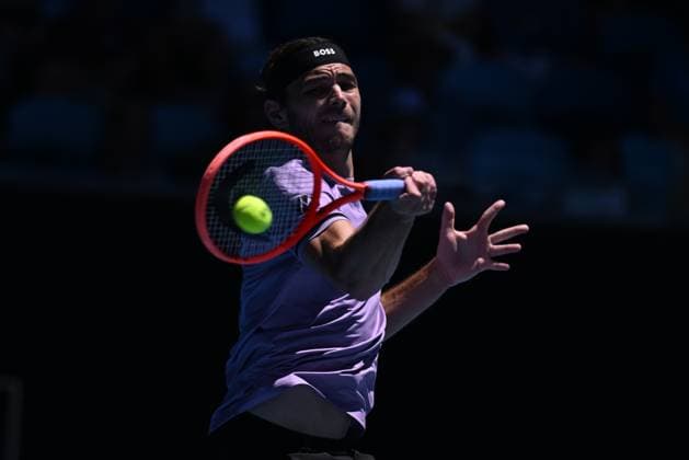 TENNIS AUSTRALIAN OPEN, Taylor Fritz of USA returns during his round three match against Gael Monfils of France during the 2025 Australian Open at Melbourne Park in Melbourne, Saturday, January 18, 2025. ( NO ARCHIVING, EDITORIAL USE ONLY, NO USE IN BOOKS WITHOUT CONSENT MELBOURNE VICTORIA AUSTRALIA  Copyright: xJAMESxROSSx 20250118167802252678
