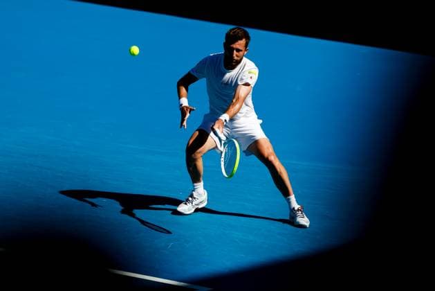 January 18, 2025: MELBOURNE, AUSTRALIA - JANUARY 18: Corentin Moutet of France hits a forehand against Learner Tien of USA on day seven of the 2025 Australian Open at Melbourne Park on January 18, 2025 in Melbourne, Australia. - ZUMAp121 20250118_zsp_p121_088 Copyright: xChrisxPutnamx