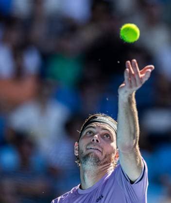 (250118) -- MELBOURNE, Jan. 18, 2025 -- Taylor Fritz serves during the men s singles 3rd round match between Taylor Fritz of the United States and Gael Monfils of France at Australian Open tennis tournament in Melbourne, Australia, Jan. 18, 2025. (Photo by Xinhua) (SP)AUSTRALIA-MELBOURNE-TENNIS-AUSTRALIAN OPEN-DAY 7 HuxJingchen 