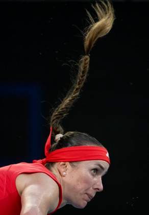 (250118) -- MELBOURNE, Jan. 18, 2025 -- Elina Svitolina of Ukraine serves during the women s singles third round match between Elina Svitolina of Ukraine and Jasmine Paolini of Italy at Australian Open tennis tournament in Melbourne, Australia, Jan. 18, 2025. ) (SP)AUSTRALIA-MELBOURNE-TENNIS-AUSTRALIAN OPEN-DAY 7 LuixSiuxWai 