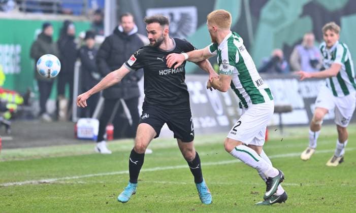 18.01.2025 - Fussball - Saison 2024 2025 - 2. Fussball - Bundesliga - 18. Spieltag: SC Preußen Preussen Münster SCP - SpVgg Greuther Fürth ( Kleeblatt ) - Sportfoto Zink - xwoxzix - DFL regulations prohibit any use of photographs as image sequences and or quasi-video - only for editorial use - Simon Asta (2, SpVgg Greuther Fürth ) Mikkel Kirkeskov Andersen (2, Preußen Münster )