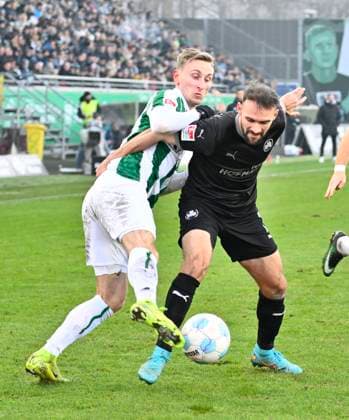 18.01.2025 - Fussball - Saison 2024 2025 - 2. Fussball - Bundesliga - 18. Spieltag: SC Preußen Preussen Münster SCP - SpVgg Greuther Fürth ( Kleeblatt ) - Sportfoto Zink - xwoxzix - DFL regulations prohibit any use of photographs as image sequences and or quasi-video - only for editorial use - Joshua Mees (8, Preußen Münster ) Simon Asta (2, SpVgg Greuther Fürth )