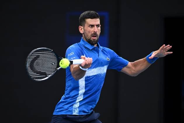 TENNIS AUSTRALIAN OPEN, Novak Djokovic of Serbia plays a shot during his round four match against Jiri Lehecka of the The Czech Republic during the 2025 Australian Open at Melbourne Park in Melbourne, Sunday, January 19, 2025. ( NO ARCHIVING, EDITORIAL USE ONLY, NO USE IN BOOKS WITHOUT CONSENT MELBOURNE VICTORIA AUSTRALIA  Copyright: xJAMESxROSSx 20250119187194824186
