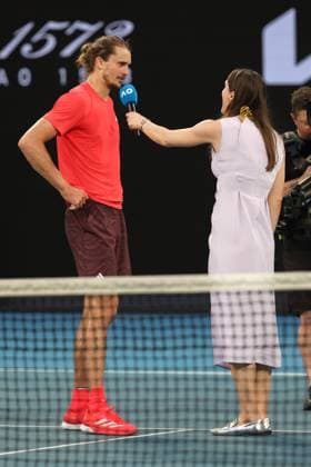 Alexander Zverev gibt Andrea Petkovic ein TV Interview auf dem Platz nach dem Sieg, Australian Open 2024, Melbourne Park, Melbourne, Victoria, Australia. Copyright: xJuergenxHasenkopfx